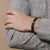 Man wearing The Humboldt Bracelet in Teal Blue